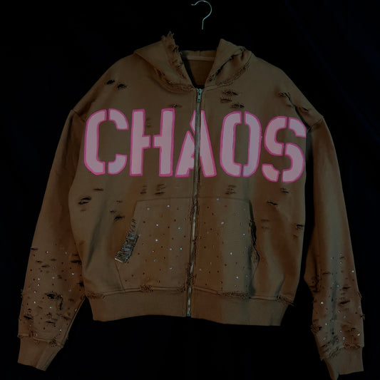 Heavy-distressed brown hoodie with pink hand-painted text, rhinestone embellishments from Prescelti Studios’ ‘A Beautiful Chaos’ collection.”
